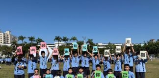 走出課本學做人!明道840名新生童軍成團 校長獻唱《十年》許下黃金承諾